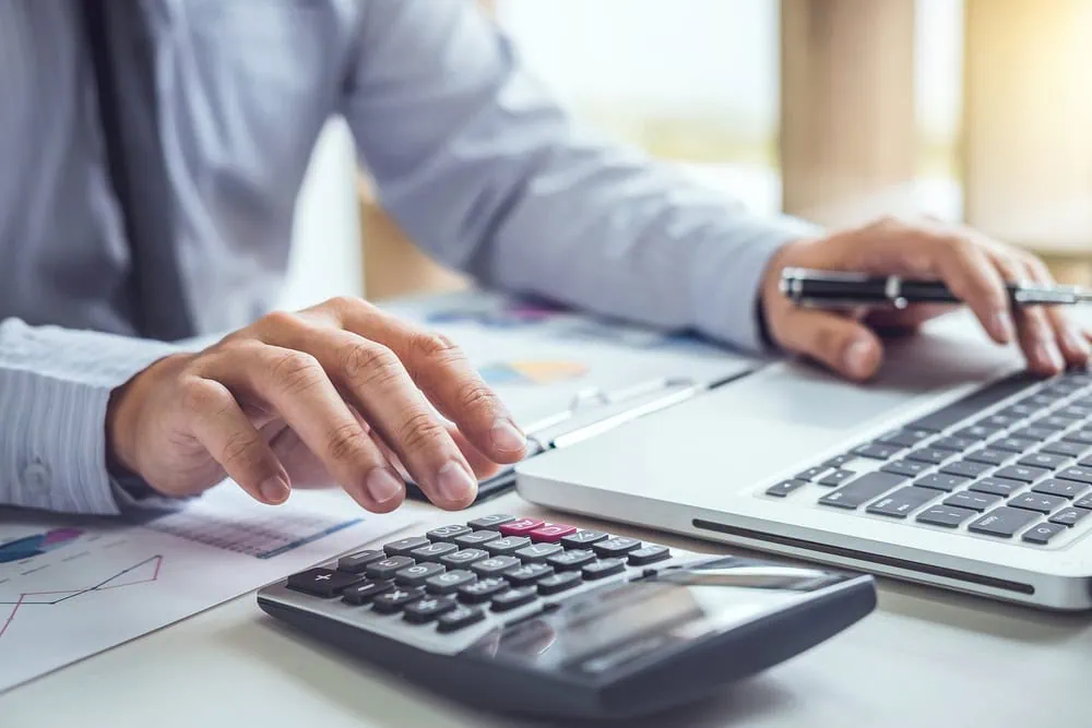 bigstock-Business-Man-Or-Accountant-Wor-245179174