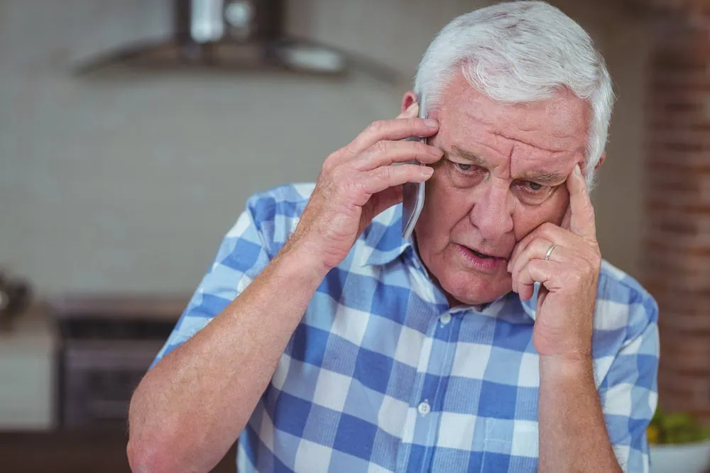 bigstock-Worried-senior-man-talking-on--170678582