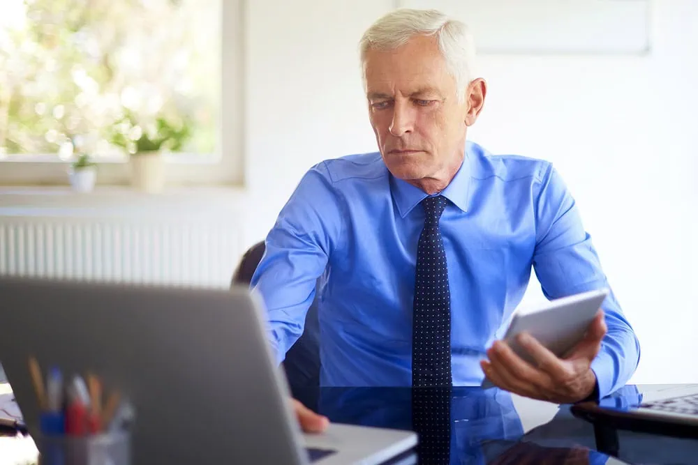 bigstock-Shot-Of-A-Handsome-Businessman-389364340