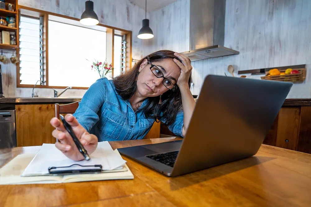 bigstock-Stressed-Business-Woman-Workin-367864531